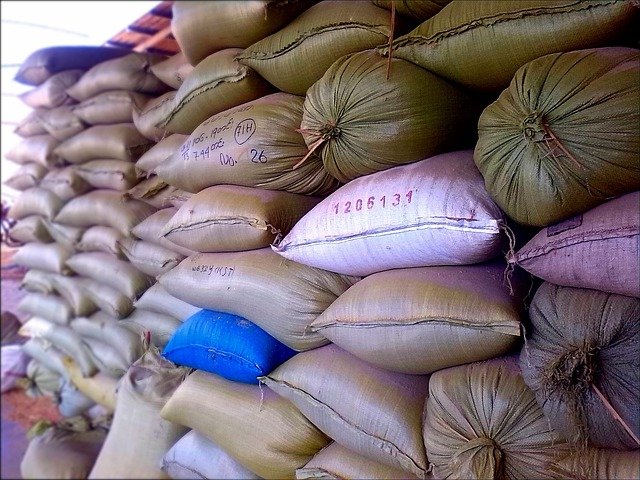 Export-ready rice sacks stacked at a warehouse